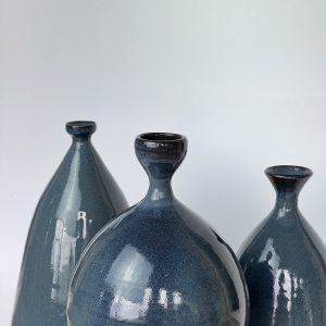 Terracotta vases family of three