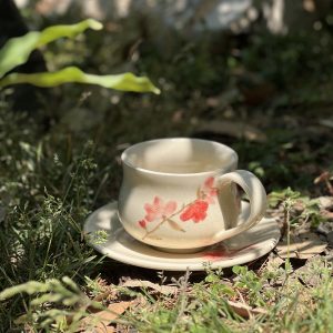 Cherry blossoms tea cup with saucer